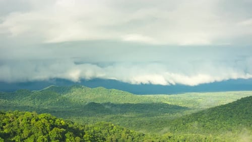Dramatic Mountain View with Overcast Sky and Greenery