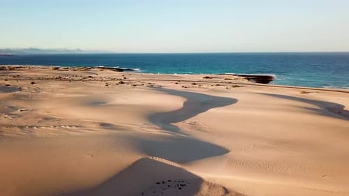 Above view of desert dunes - concept of wild adventure travel destination and beauty