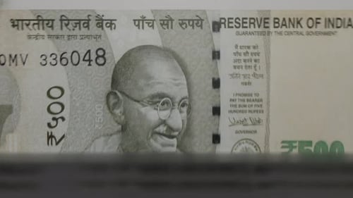 500 Indian rupees banknotes in cash machine.