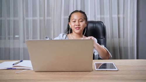 Girl at Laptop Having an Online Class