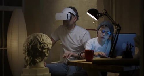 Adult and Child Use Virtual Reality at Home