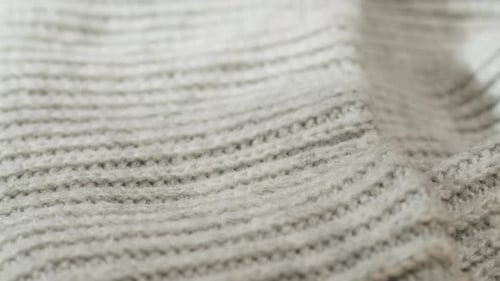 Grey Knitted Cloth Light Gray Woolen Clothes Fabric Closeup Woven Textile Background