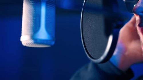 Male Rap Singer Sings Hip Hop in Microphone