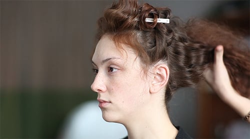 Woman Getting Her Curly Hair Styled