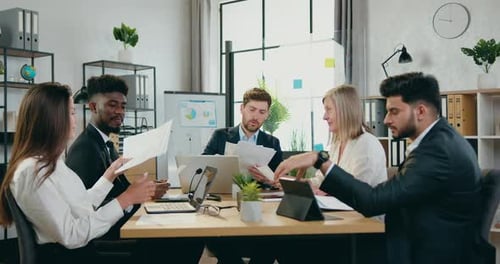Professionals Collaborating During a Business Meeting