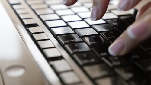 Modern female in office room slow motion typing on laptop keyboard 1920X1080 FullHD footage - Close