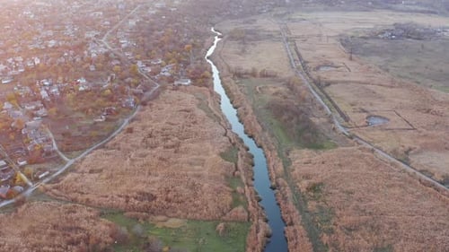 River among the autumn fields.