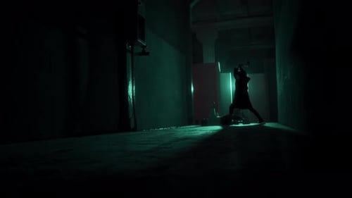 Dimly Lit Silhouette in a Mysterious Urban Alleyway