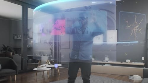 Young Adult Interacts with Virtual Reality Interface