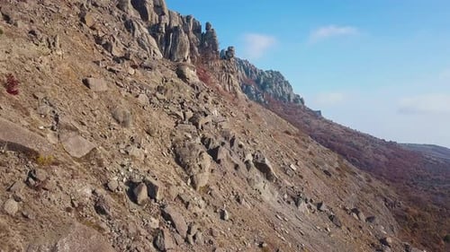 Drone Flies Along a Rocky Mountain Ridge