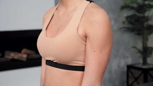 Strong Fit Muscular Girl Sportswoman Does Sports Exercises on Muscles Arms