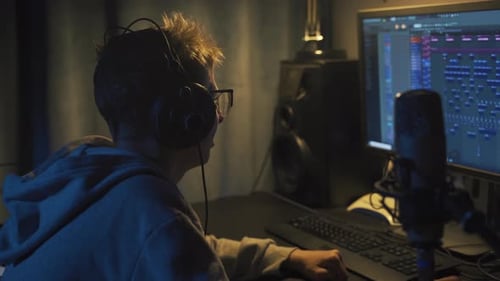 Teenager at Home Composes Music In His Home Sound Studio