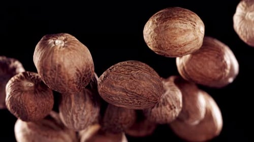 Nutmeg Spice Tumbling in Slow Motion