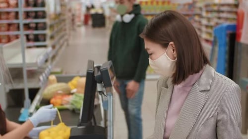Packing Products In Supermarket