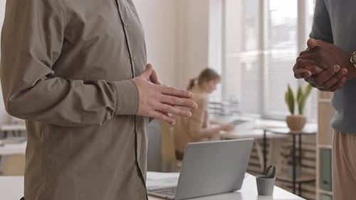 Handshake of Cropped Colleagues