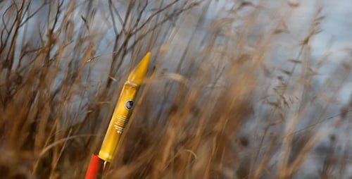 Rocket being launched outdoors during daytime