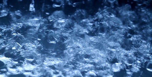 Boiling Water Churning with Blue Lighting