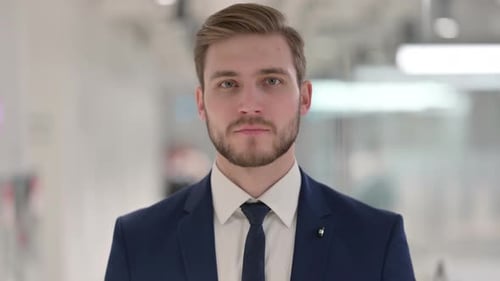 Serious Young Adult in a Business Suit Portrait