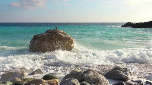Evening Sea Surf on a Rocky Shore