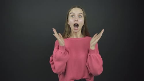 Brunette with Long Loose Hair Performs Scare Emotion
