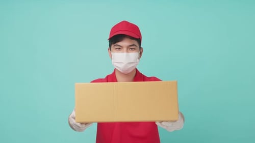 Delivery Man Holding Box with Face Mask