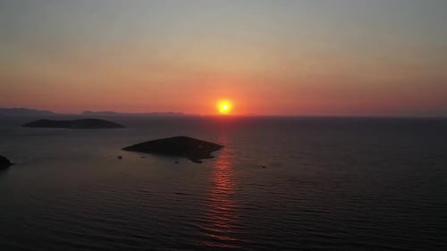 Aerial View of Serene Island Sunset Ocean Landscape