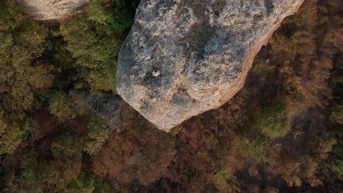 Woman Standing on Rock Mountain Top Aerial View