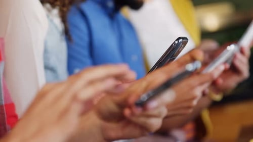 People Using Smartphones in Urban Environment