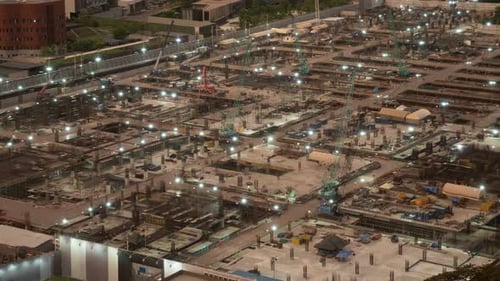 Time Lapse of Construction Site with Heavy Construction Machinery in Metropolis