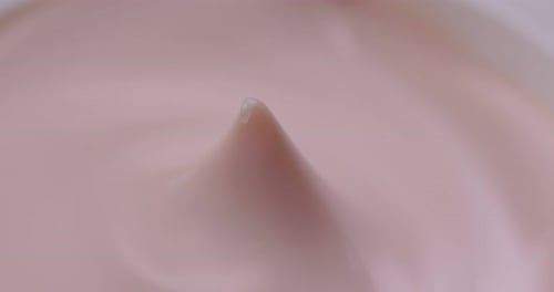 Pink Cosmetic Cream in a Close Up Shot