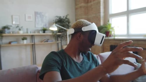 Man Enjoys Immersive VR Experience at Home