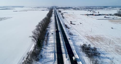 Aerial View of the Snow Road in Winter