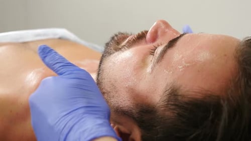 Man Receiving Relaxing Massage Treatment