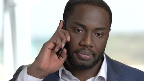 Close Up Afro-american Businessman Talking on Phone