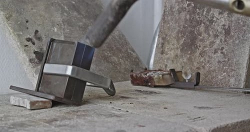 Metalwork Craft Using a Torch on Workbench