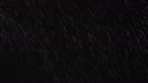 Abstract Rain Footage on Black Surface