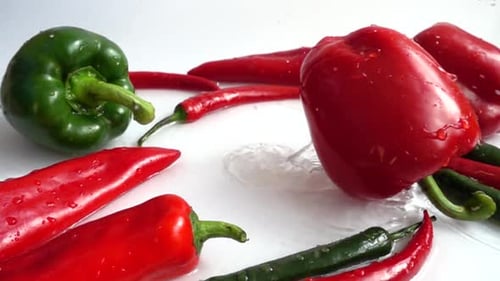 Fresh Peppers and Vegetables with Splashing Water