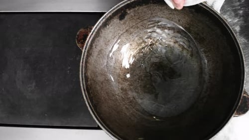 Adding Oil into Dutch Oven