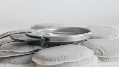 Close up of coffee pods and espresso filter