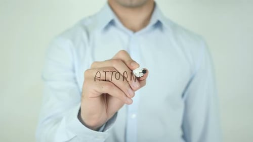 Adult Writing Attorney on Clear Surface