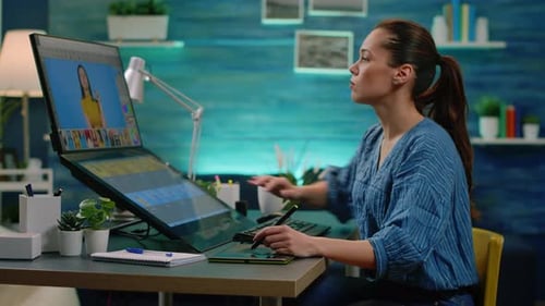 Woman Editing Photos Using Digital Workstation at Home
