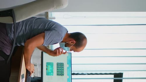 Man and Woman Analyzing Data at Office Workplace