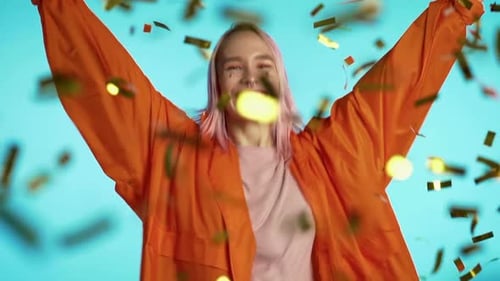 Smiling Woman Celebrates With Confetti
