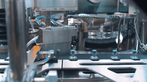 Machine Filling Vials in Pharmaceutical Factory