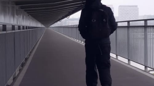 Unrecognizable Person in Town