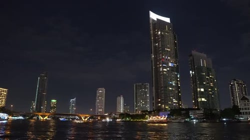 metropolis with skyscrapers at night. office corporate buildings in bangkok