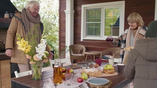 Family Eating Outside on the Porch