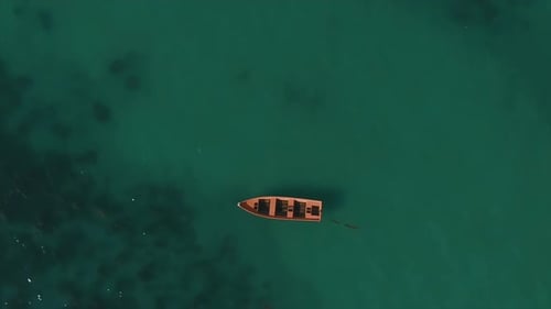Aerial View of Tropical Boat on Turquoise Ocean