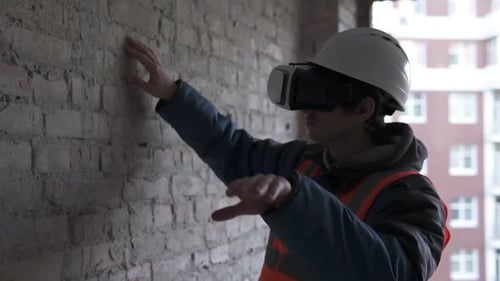 Engineer Using VR Headset During Building Construction