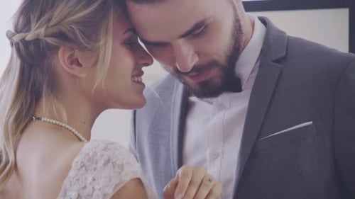 Romantic Couple Holding Hands and Kissing